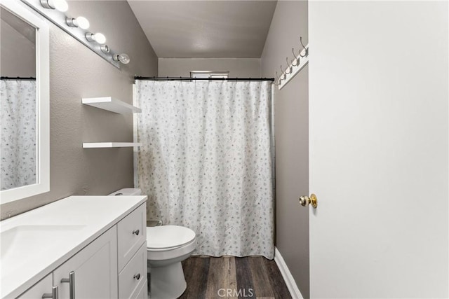 1149 Cochise Ct, Vista, CA 92084 - bathroom with wood finished floors, vanity, and toilet