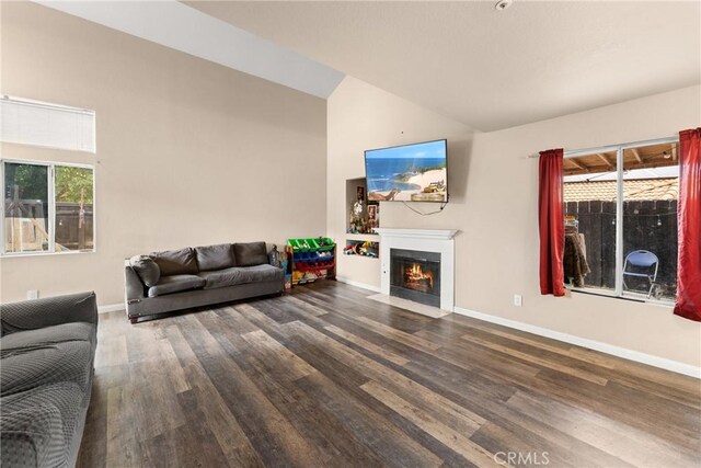 1149 Cochise Ct, Vista, CA 92084 - living area with wood finished floors, a fireplace with flush hearth, baseboards, and high vaulted ceiling