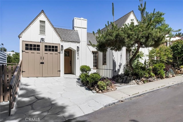 2376 Lake View Ave, Los Angeles, CA 90039 - tudor home with a shingled roof, board and batten siding, and driveway