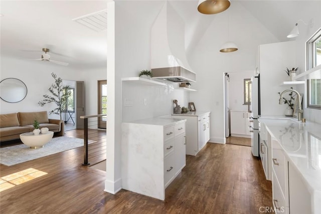 2376 Lake View Ave, Los Angeles, CA 90039 - kitchen featuring open shelves, custom exhaust hood, healthy amount of natural light, light countertops, and high vaulted ceiling