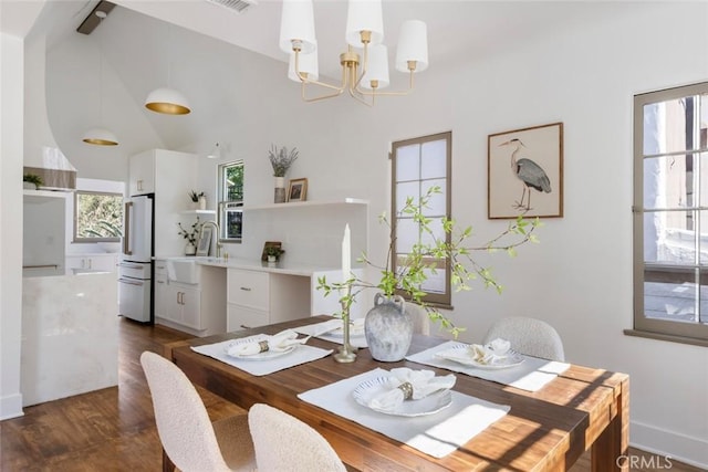 2376 Lake View Ave, Los Angeles, CA 90039 - dining area featuring a chandelier, dark wood-style flooring, and lofted ceiling