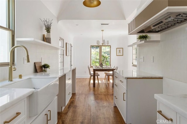 2376 Lake View Ave, Los Angeles, CA 90039 - kitchen featuring open shelves, dark wood-style floors, white cabinets, tasteful backsplash, and hanging light fixtures