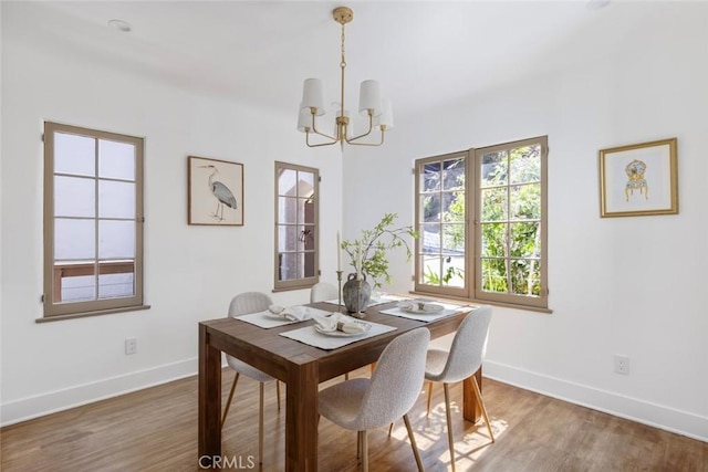 2376 Lake View Ave, Los Angeles, CA 90039 - dining room featuring a chandelier and wood finished floors