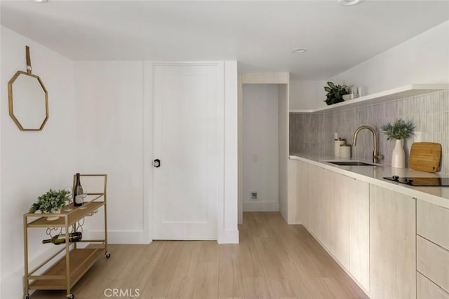 2376 Lake View Ave, Los Angeles, CA 90039 - corridor with a sink and light wood-style flooring