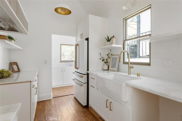 2376 Lake View Ave, Los Angeles, CA 90039 - kitchen featuring open shelves, freestanding refrigerator, wood finished floors, and healthy amount of natural light