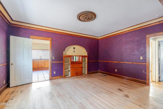 332 N St Louis St, Los Angeles, CA 90033 - spare room with light wood finished floors, baseboards, and crown molding