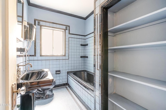 332 N St Louis St, Los Angeles, CA 90033 - bathroom featuring toilet, tiled tub, tile walls, a sink, and ornamental molding