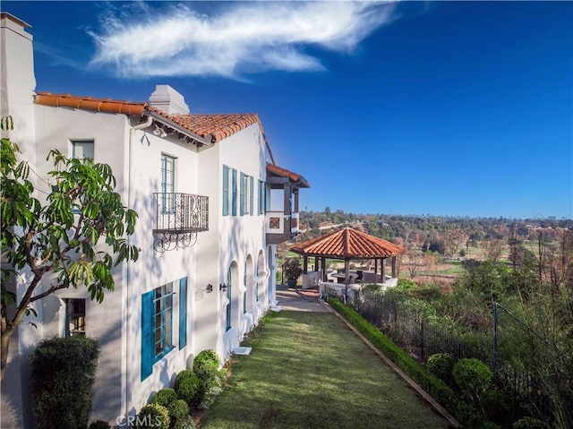 1812 Linda Vista Ave, Pasadena, CA 91103 - view of home's exterior featuring a gazebo, a tiled roof, a chimney, stucco siding, and a balcony