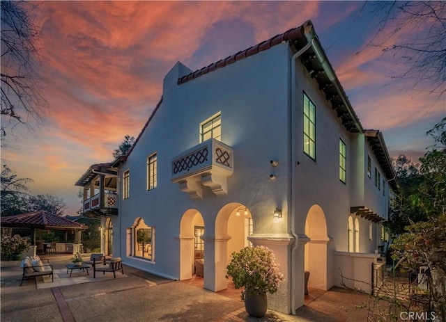 1812 Linda Vista Ave, Pasadena, CA 91103 - view of front of property with a balcony, a gazebo, a patio, and stucco siding