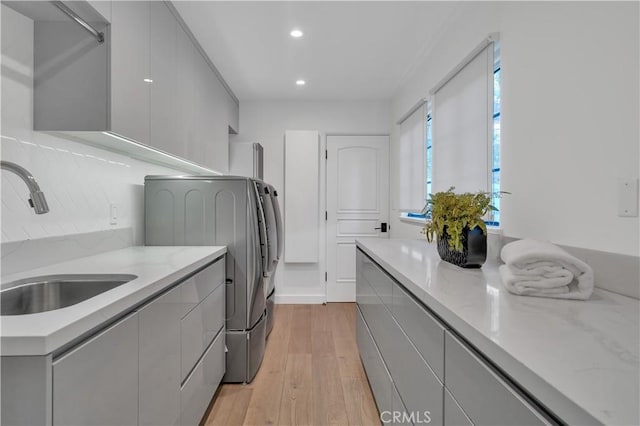 1812 Linda Vista Ave, Pasadena, CA 91103 - washroom with cabinet space, light wood-type flooring, recessed lighting, and washer and clothes dryer