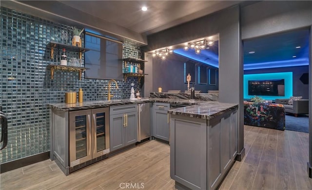 1812 Linda Vista Ave, Pasadena, CA 91103 - indoor wet bar with wine cooler, light wood-style floors, recessed lighting, and tasteful backsplash