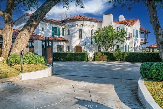1812 Linda Vista Ave, Pasadena, CA 91103 - view of front of home with a tile roof, stucco siding, and a chimney