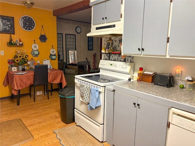 216 College Ave, Weed, CA 96094 - kitchen featuring white appliances, custom exhaust hood, light wood finished floors, white cabinets, and wooden walls