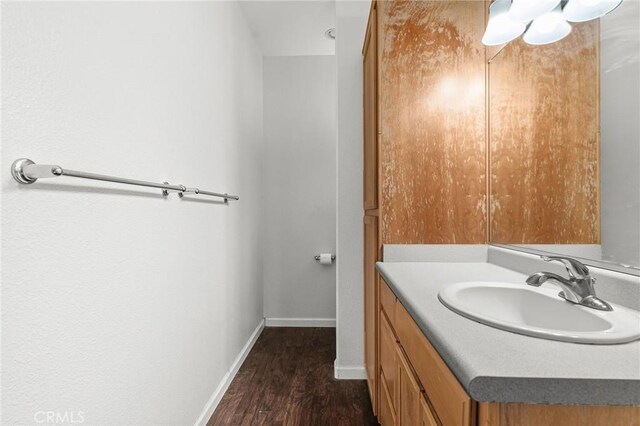 4930 Contentment Ln, Forest Ranch, CA 95942 - bathroom featuring vanity, wood finished floors, and baseboards