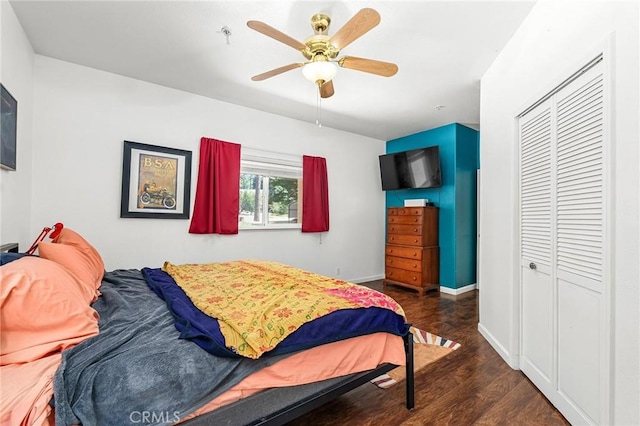 4930 Contentment Ln, Forest Ranch, CA 95942 - bedroom featuring a closet, wood finished floors, baseboards, and ceiling fan