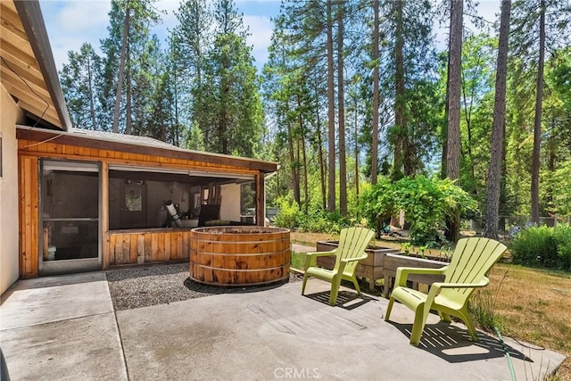 4930 Contentment Ln, Forest Ranch, CA 95942 - view of patio featuring an outdoor fire pit and a sunroom