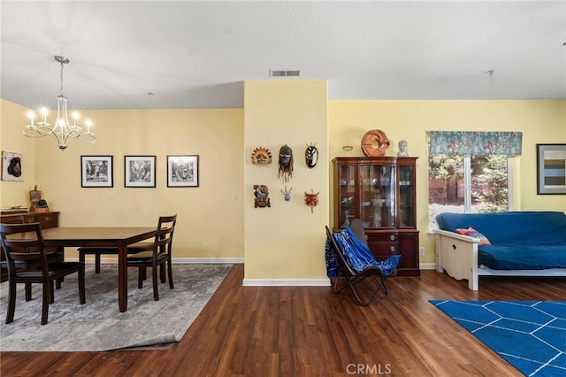 4930 Contentment Ln, Forest Ranch, CA 95942 - dining space featuring a chandelier, wood finished floors, and baseboards