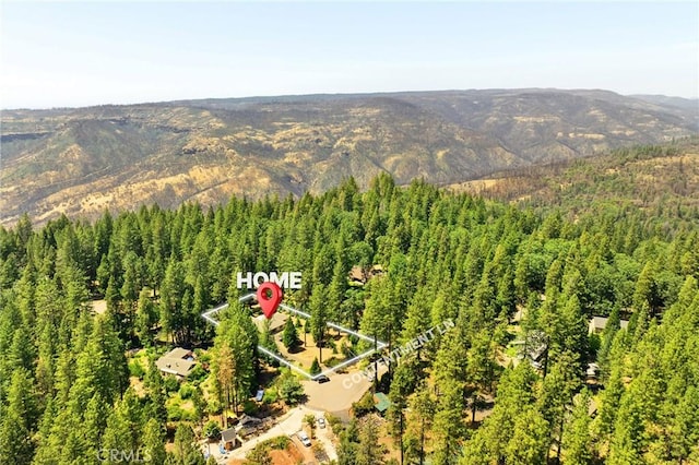 4930 Contentment Ln, Forest Ranch, CA 95942 - drone / aerial view of a heavily wooded area and a mountainous background