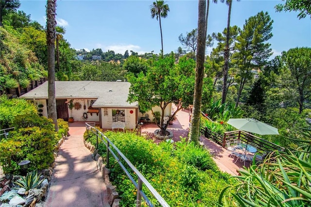 3935 Oakfield Dr, Sherman Oaks, CA 91423 - rear view of property featuring view of scattered trees