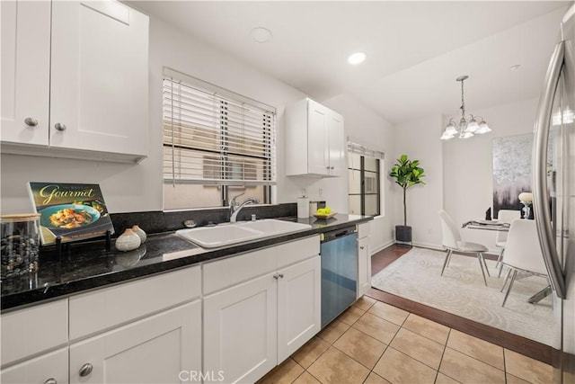 879 Michigan Blvd Unit B, Pasadena, CA 91107 - kitchen with stainless steel appliances, a sink, light tile patterned flooring, white cabinetry, and recessed lighting