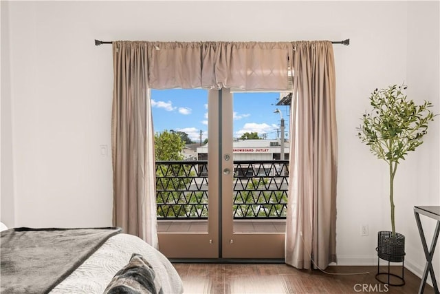 879 Michigan Blvd Unit B, Pasadena, CA 91107 - bedroom featuring french doors, access to outside, wood finished floors, and baseboards