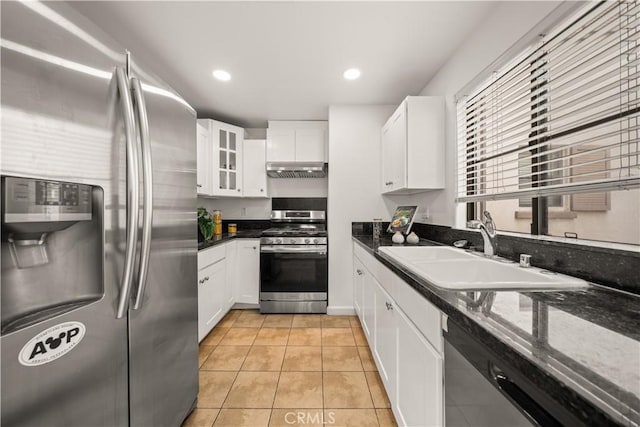 879 Michigan Blvd Unit B, Pasadena, CA 91107 - kitchen featuring stainless steel appliances, a sink, under cabinet range hood, light tile patterned floors, and white cabinetry