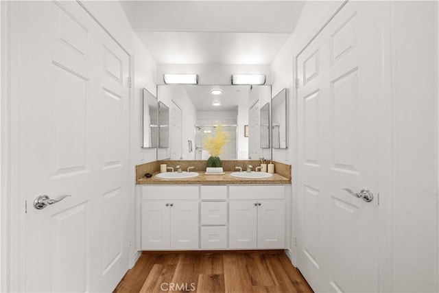 879 Michigan Blvd Unit B, Pasadena, CA 91107 - bathroom featuring double vanity, a stall shower, and wood finished floors