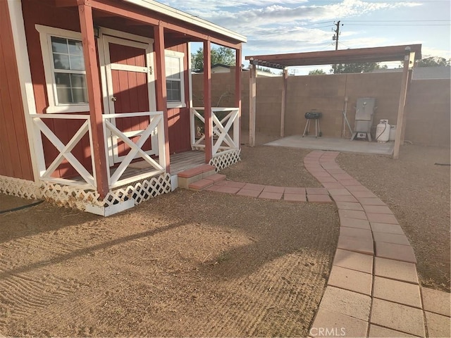 7870 Hopi Trl, Yucca Valley, CA 92284 - view of patio / terrace featuring an outbuilding
