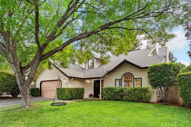 13 Noyo Ct, Chico, CA 95973 - traditional-style home with asphalt driveway, a shingled roof, a garage, and a chimney