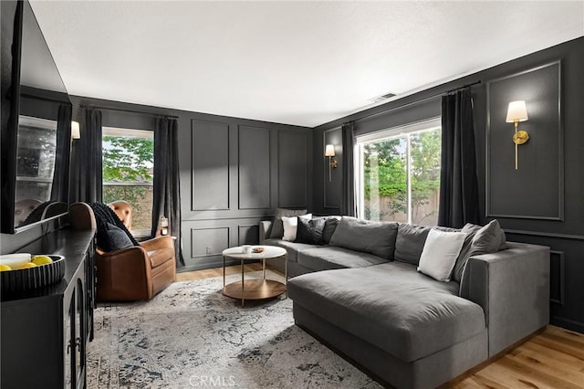 13 Noyo Ct, Chico, CA 95973 - living room with a decorative wall, healthy amount of natural light, and light wood-style floors