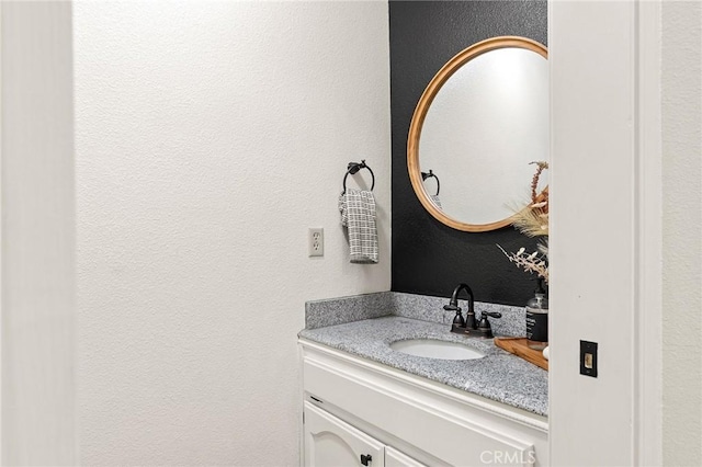 13 Noyo Ct, Chico, CA 95973 - bathroom featuring vanity and a textured wall