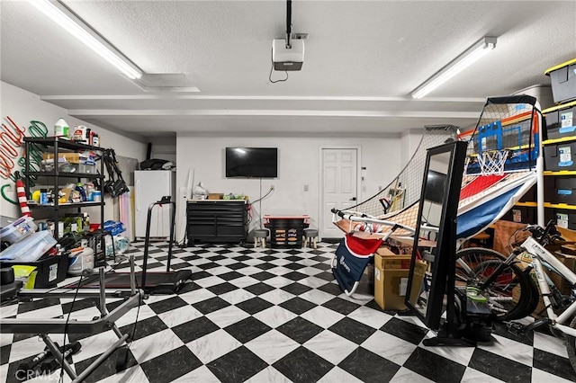 13 Noyo Ct, Chico, CA 95973 - garage with freestanding refrigerator and a garage door opener