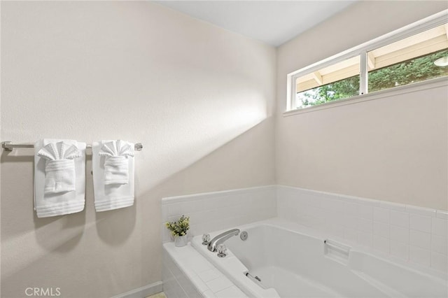 13 Noyo Ct, Chico, CA 95973 - bathroom featuring a bath and baseboards