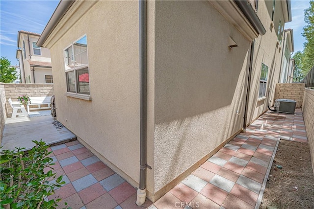 21836 Moveo Dr, Saugus, CA 91350 - view of home's exterior featuring stucco siding and a patio area
