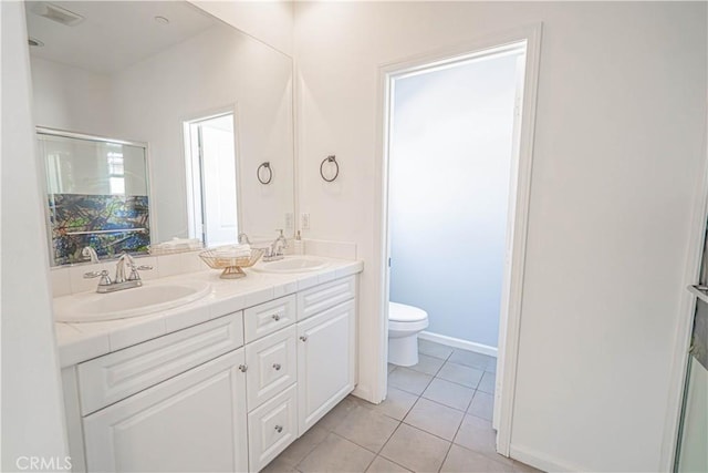 21836 Moveo Dr, Saugus, CA 91350 - bathroom featuring double vanity, tile patterned floors, and a stall shower