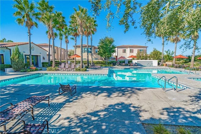 21836 Moveo Dr, Saugus, CA 91350 - community pool featuring a patio and a residential view
