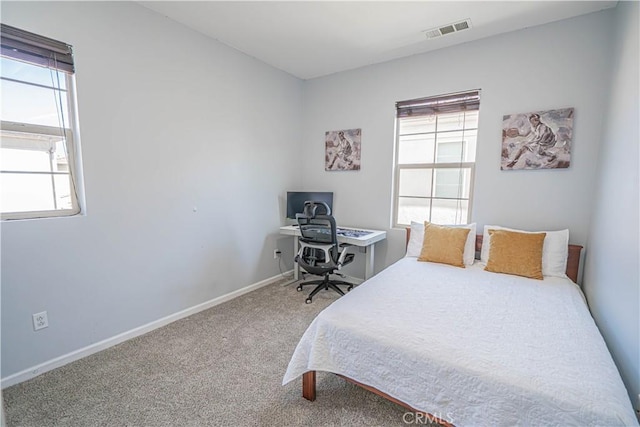 21836 Moveo Dr, Saugus, CA 91350 - carpeted bedroom with multiple windows and an office area