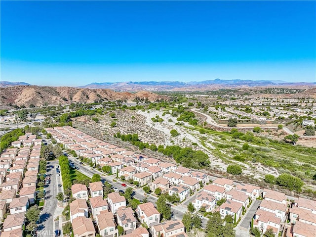 21836 Moveo Dr, Saugus, CA 91350 - aerial view of property and surrounding area with a mountainous background and nearby suburban area