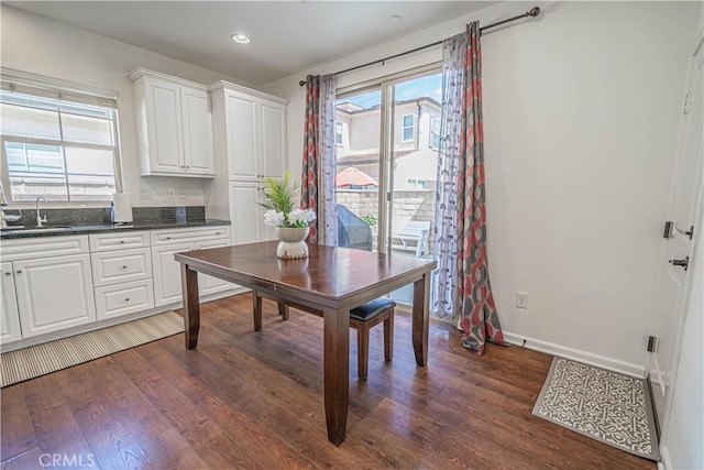 21836 Moveo Dr, Saugus, CA 91350 - dining space featuring dark wood-style flooring, healthy amount of natural light, and recessed lighting
