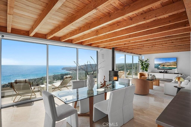 1119 Katella St, Laguna Beach, CA 92651 - sunroom / solarium with a wood stove and beamed ceiling