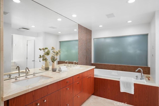 1119 Katella St, Laguna Beach, CA 92651 - bathroom with double vanity, a bath, and recessed lighting