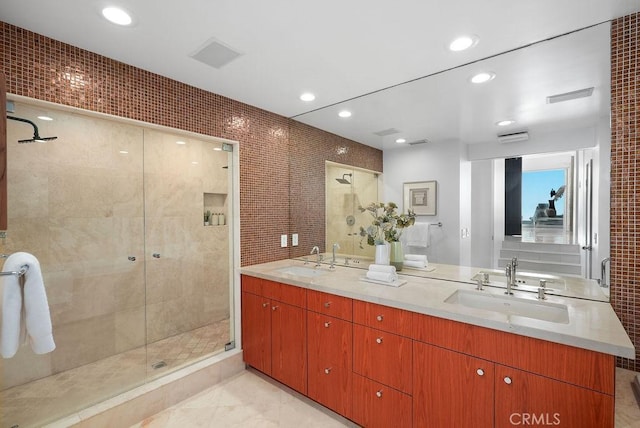 1119 Katella St, Laguna Beach, CA 92651 - full bath featuring double vanity, a stall shower, recessed lighting, and tile walls