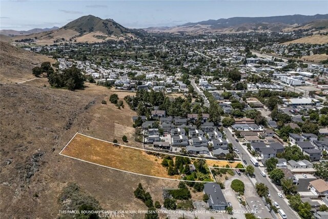 3143 Rockview Pl, San Luis Obispo, CA 93401 - aerial view of residential area featuring property boundaries highlighted and a mountainous background