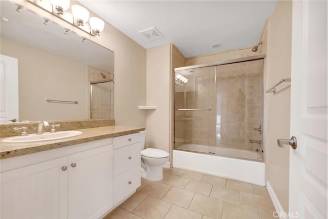 1539 Windshore Way, Oxnard, CA 93035 - bathroom featuring tile patterned flooring, toilet, vanity, and combined bath / shower with glass door
