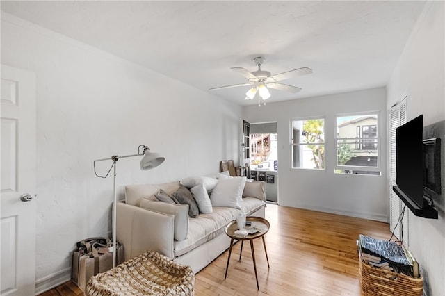 2468 Silverstrand Ave, Hermosa Beach, CA 90254 - living area featuring a ceiling fan and light wood-style flooring