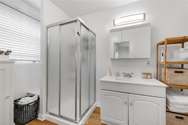 2468 Silverstrand Ave, Hermosa Beach, CA 90254 - full bath with vanity, a shower stall, and wood finished floors