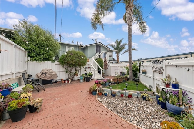 2468 Silverstrand Ave, Hermosa Beach, CA 90254 - fenced backyard featuring a patio area and stairs