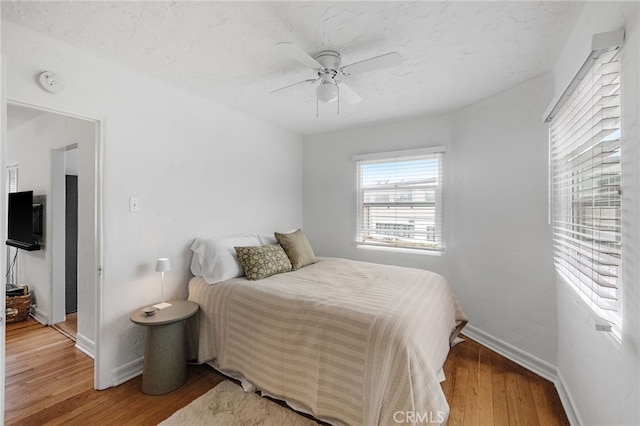 2468 Silverstrand Ave, Hermosa Beach, CA 90254 - bedroom featuring wood finished floors, ceiling fan, and a textured ceiling