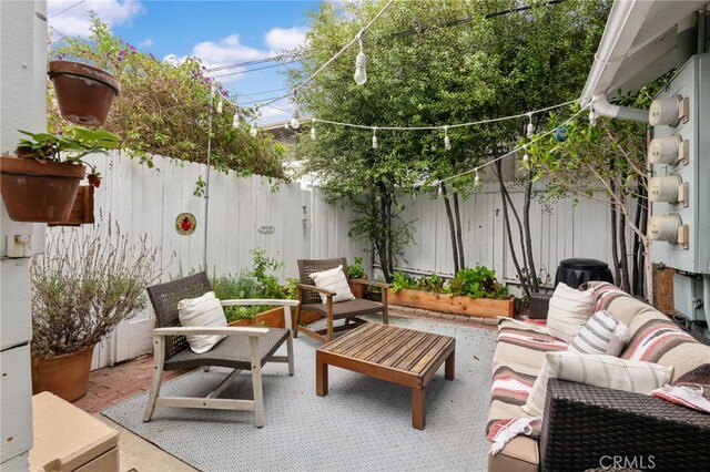 2468 Silverstrand Ave, Hermosa Beach, CA 90254 - fenced backyard featuring a patio and outdoor lounge area