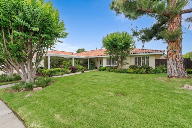 1162 Castlegate, North Tustin, CA 92705 - view of front of home with a tiled roof and stucco siding